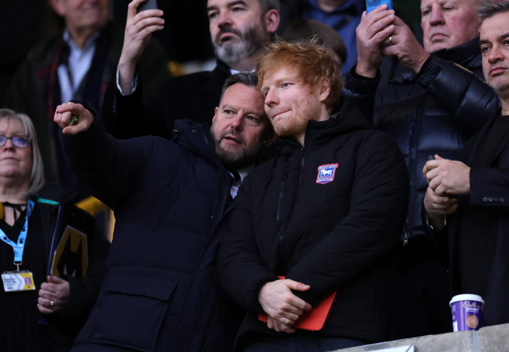 Mark Ashton speaks with Ed Sheeran during Ipswich vs Wolves