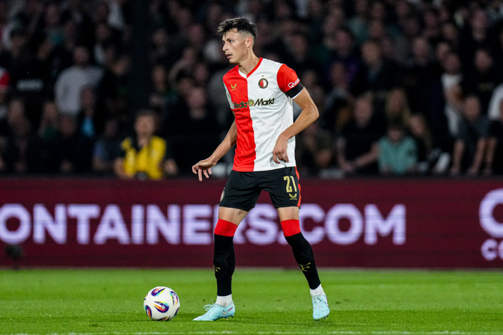 Anel Ahmedhodzic dribbles with the ball during Feyenoord v Fenerbahce