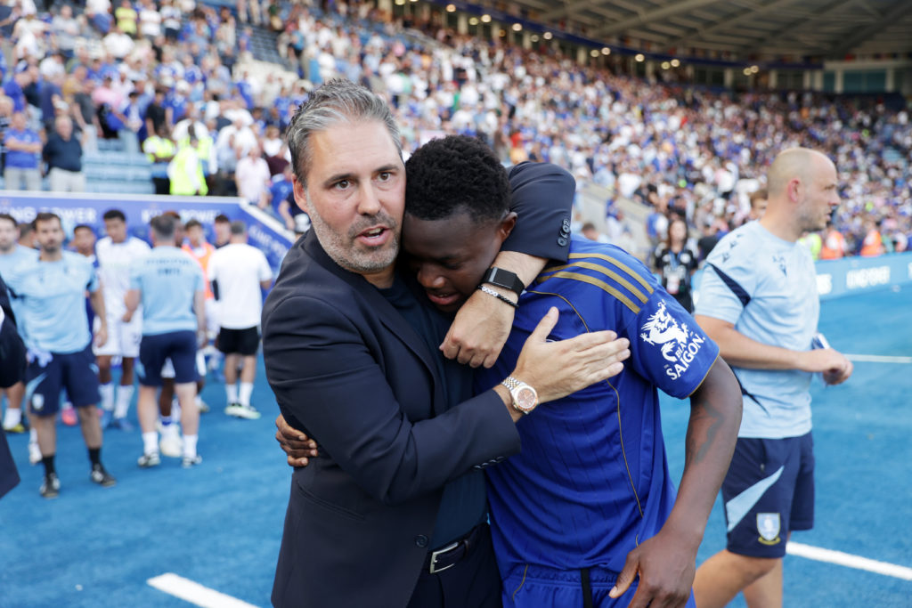 Marti Cifuentes and Abdul Fatawu embrace each other after Leicester City beat Sheffield Wednesday
