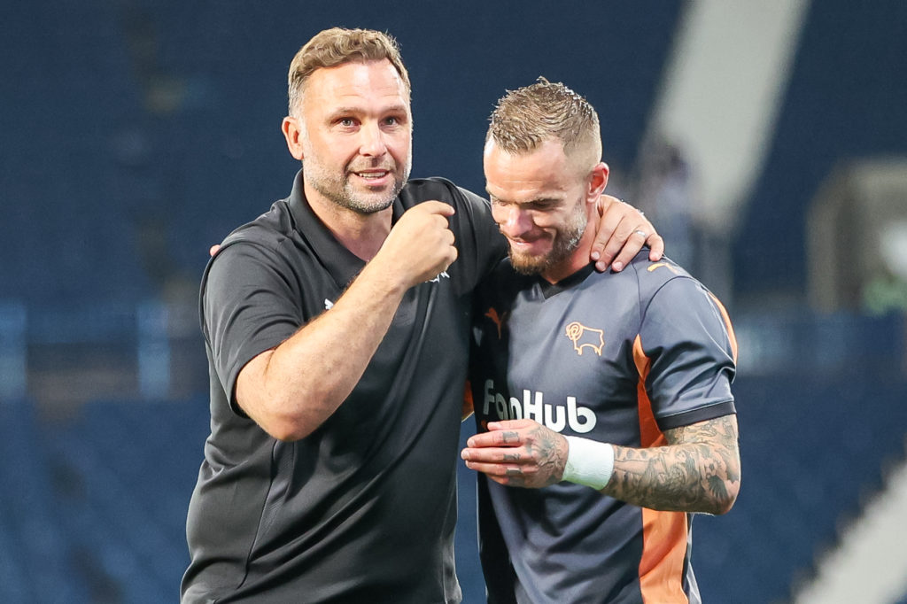 John Eustace and Joe Ward of Derby County celebrate the win as they progress to the next round during the Carabao Cup match between West Bromwich Albion and Derby County