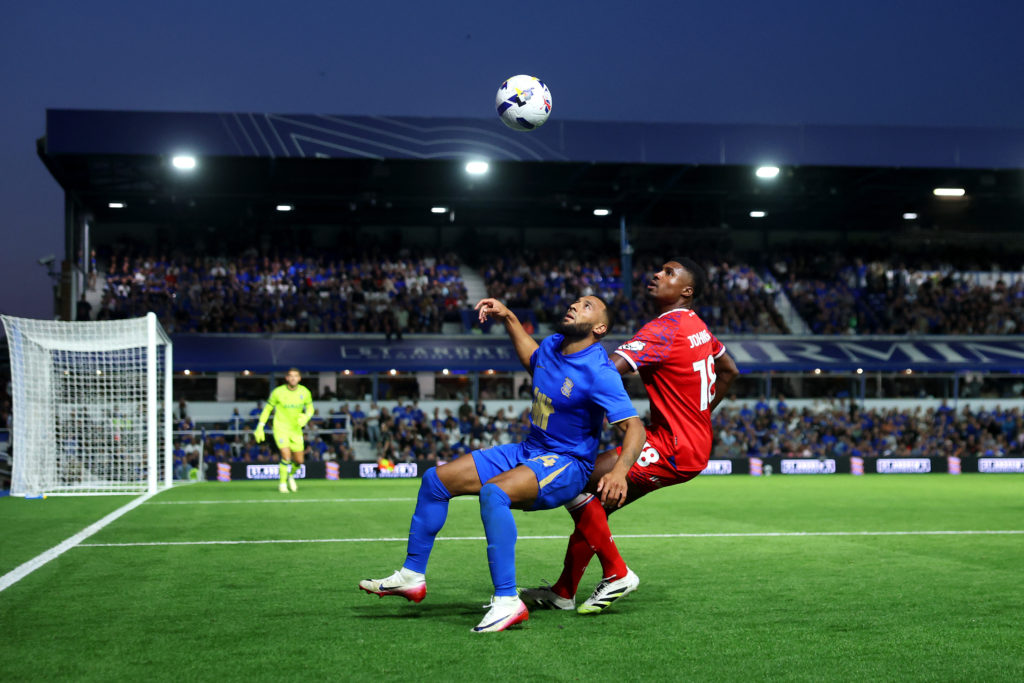 Keshi Anderson of Birmingham City is challenged