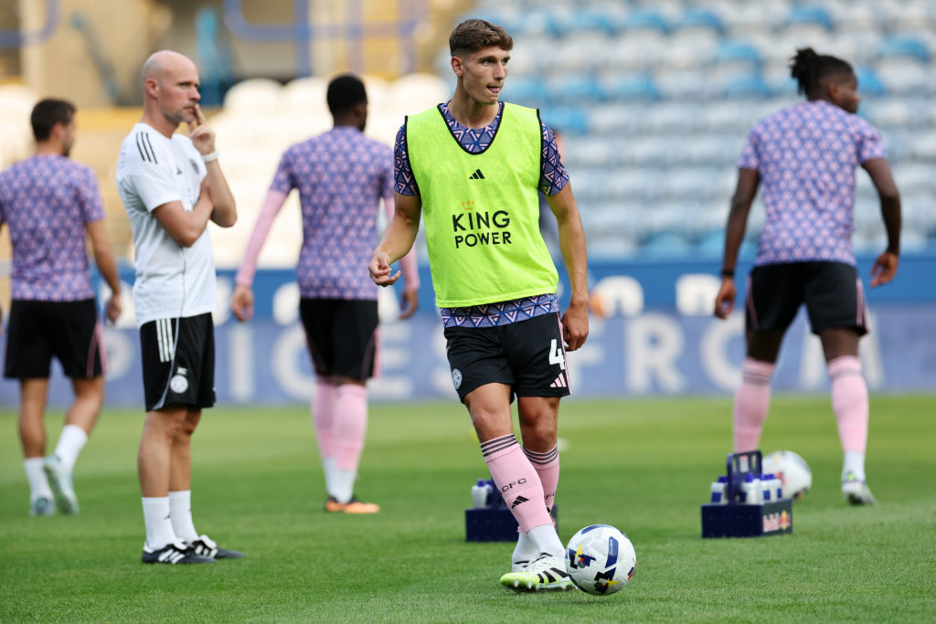 Ben Nelson warms up ahead of the Carabao Cup tie between Huddersfield Town and Leicester City