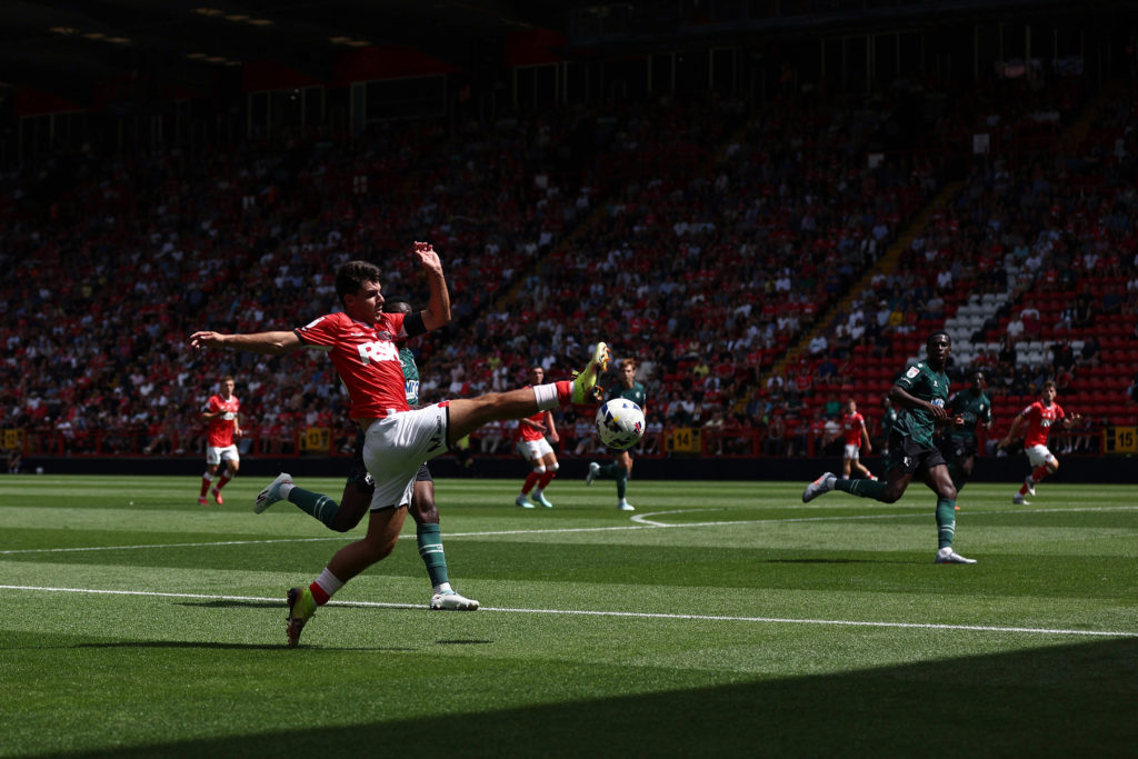 Rob Apter stretches for the ball against Watford
