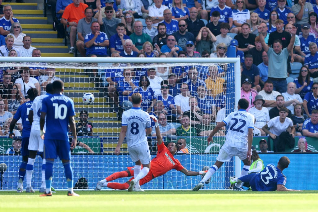Jannik Vestergaard heads past Pierce Charles during Leicester City vs Sheffield Wednesday