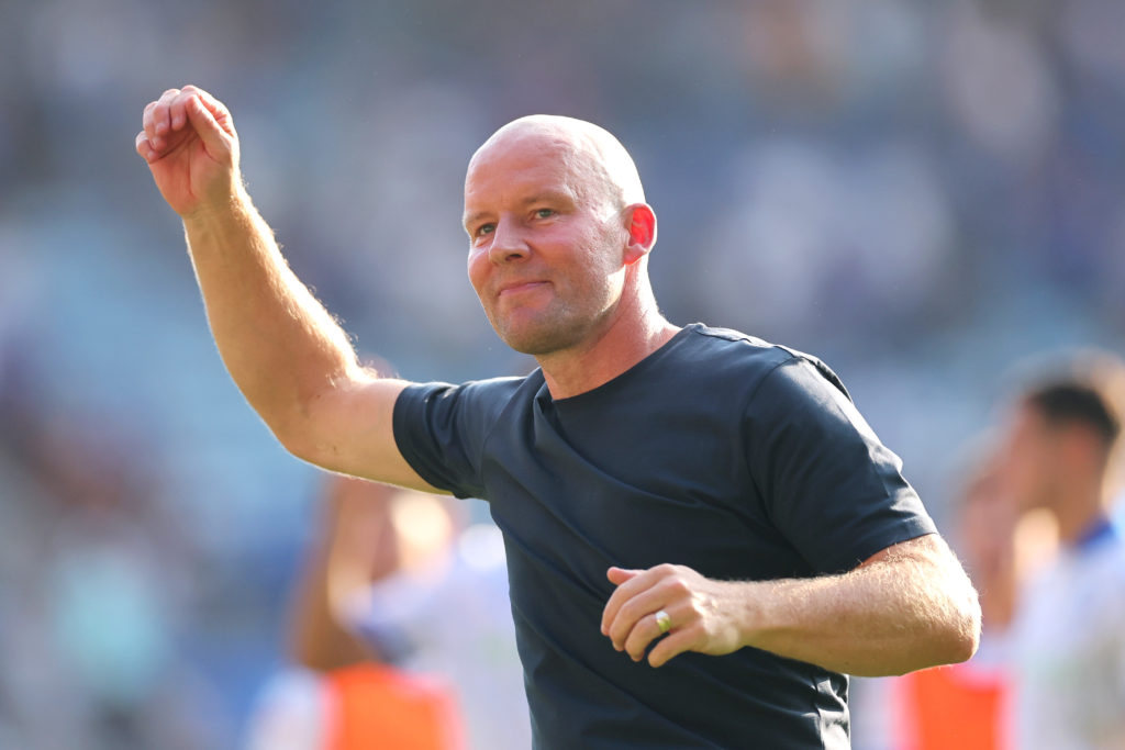 Henrik Pedersen, Manager of Sheffield Wednesday, acknowledges the fans