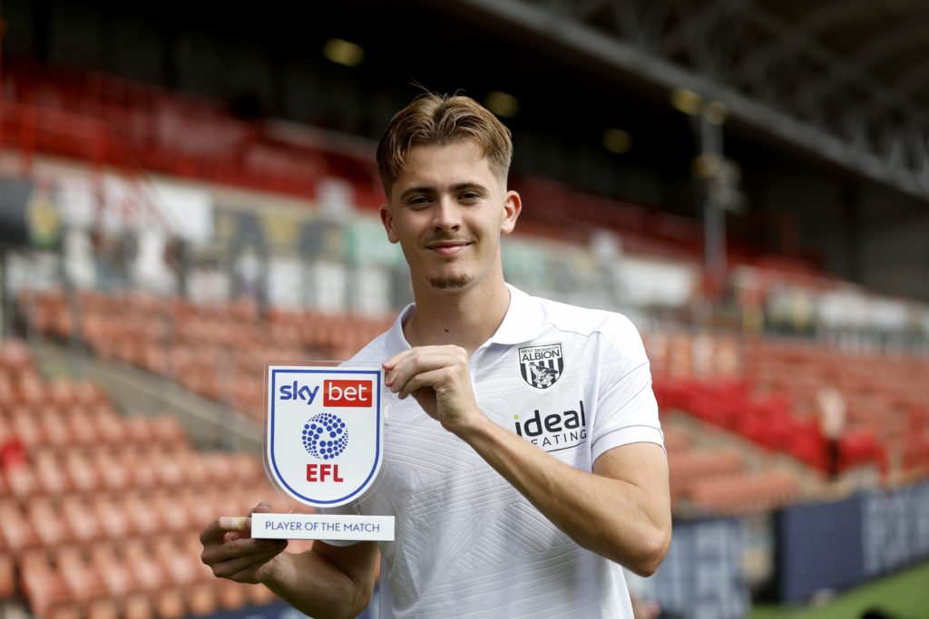 saac Price of West Bromwich Albion with the player of the match award after the 2-3 win against Wrexham