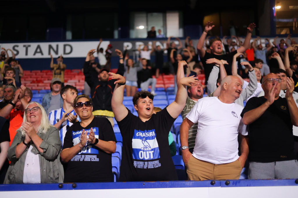 A Sheffield Wednesday supporter's shirt is seen with a message aimed at Sheffield Wednesday director Dejphon Chansiri