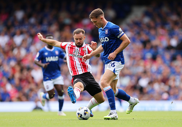 Dara O'Shea of Ipswich Town is challenged