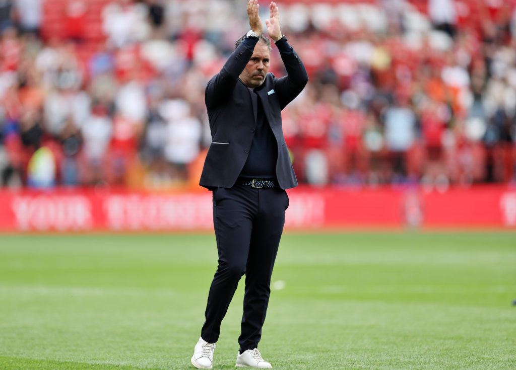 Leicester City Manager Martí Cifuentes applauds the travelling Leicester City fans