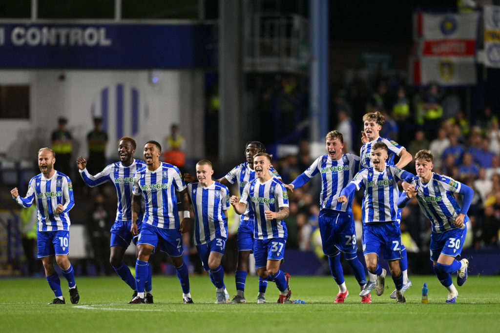Sheffield Wednesday's players celebrate as they win the penalty shoot-out during the English League Cup second round football match between Sheffield Wednesday and Leeds United
