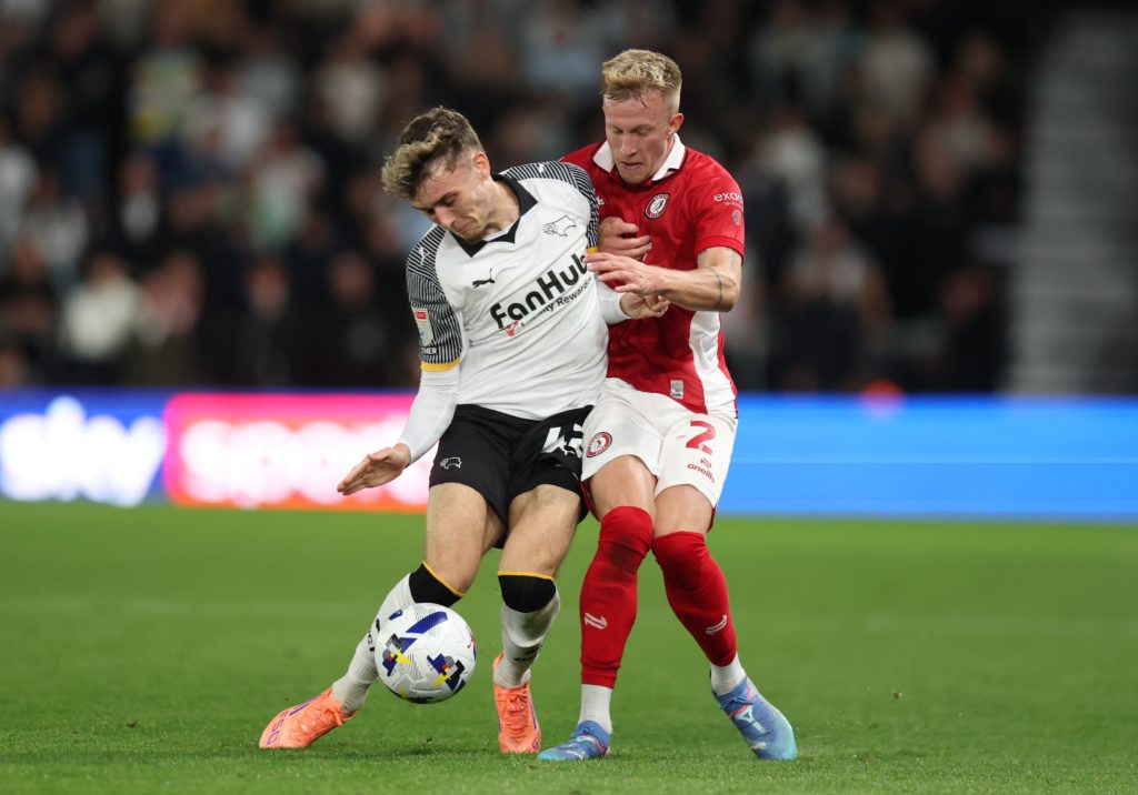 Bobby Clark of Derby is challenged by Ross McCrorie of Bristol City during the Sky Bet Championship match between Derby County and Bristol City