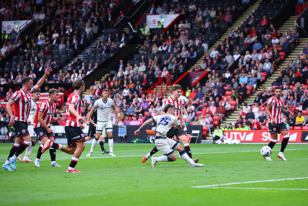 Luke Cundle of Millwall scores against Sheffield United