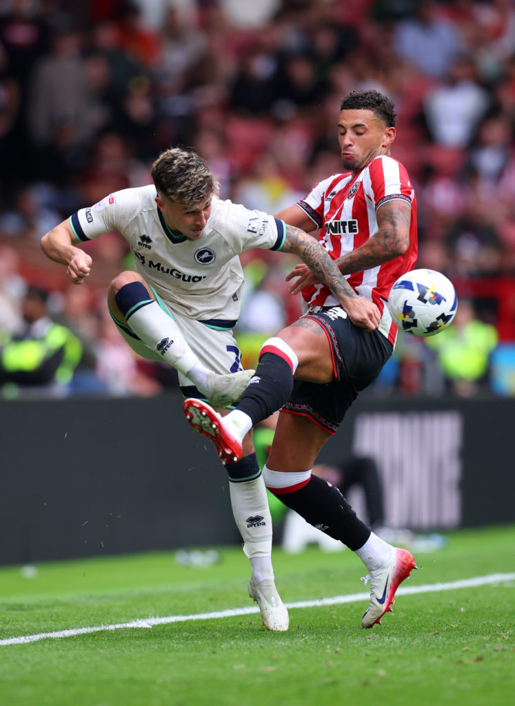 Ben Godfrey of Sheffield United battles with Millwall's Luke Cundle