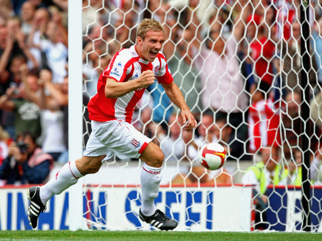 Liam Lawrence of Stoke City celebrates scoring the opening goal from the penalty spot against Aston Villa