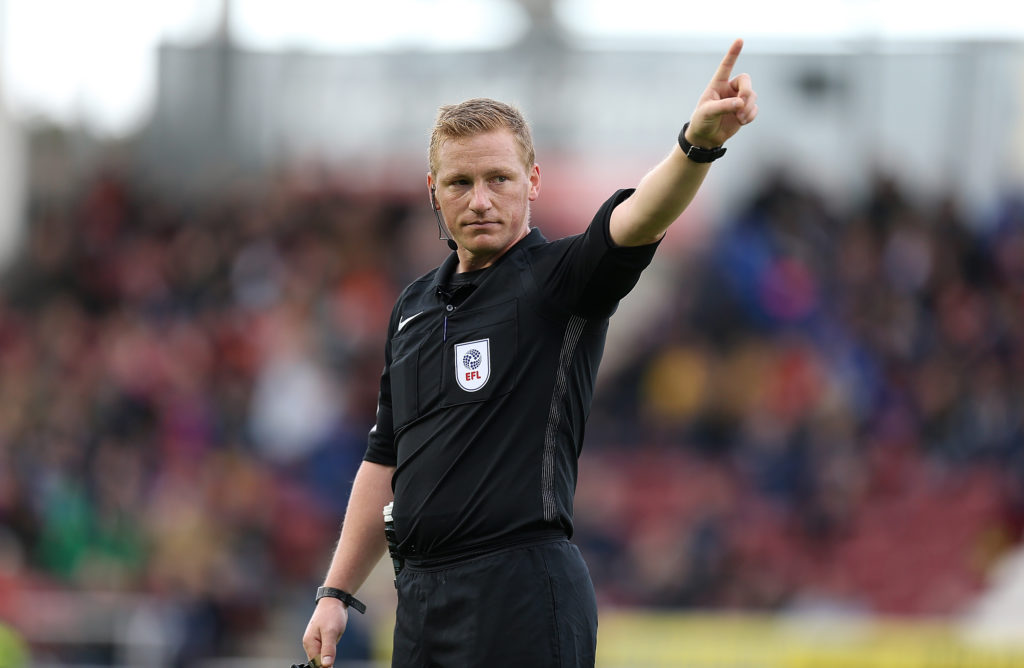 John Busby in charge of Northampton Town against Blackpool