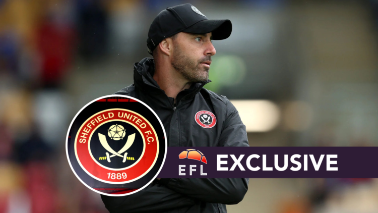 Ruben Selles, manager of Sheffield United, looks on. A general view of the Sheffield United club badge.