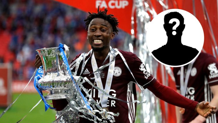 Wilfred Ndidi of Leicester City celebrates with the FA Cup trophy, an inset of a mystery man