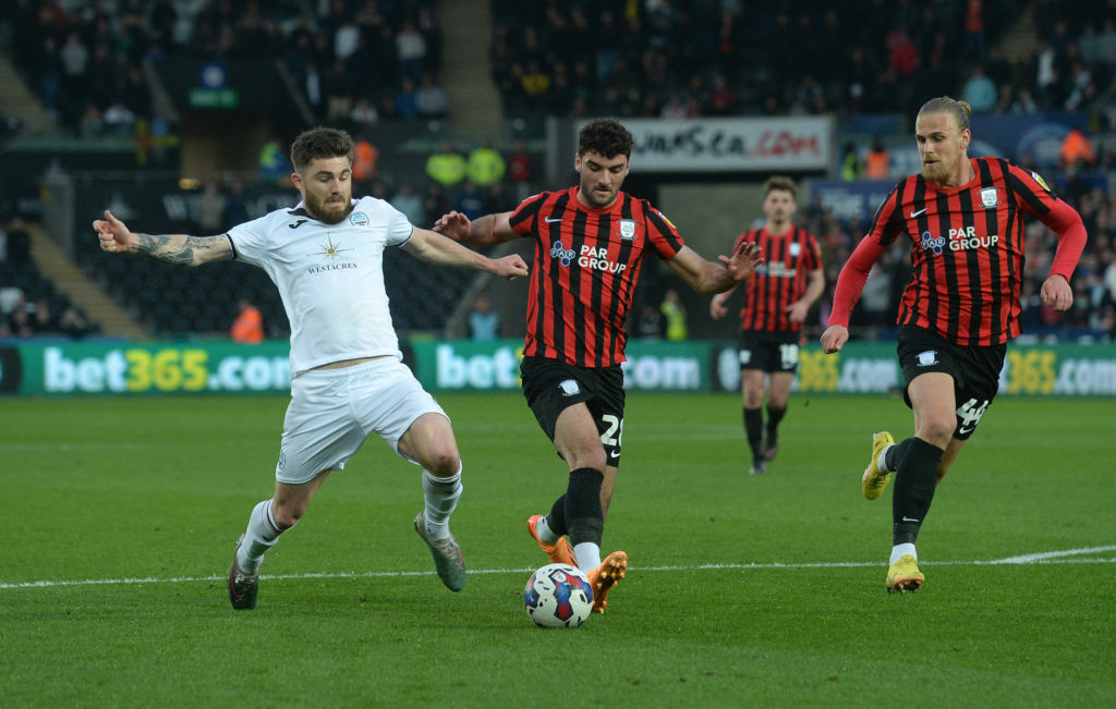 Preston North End's Tom Cannon battles with Swansea City's Ryan Manning during the Sky Bet Championship between Swansea City and Preston North End