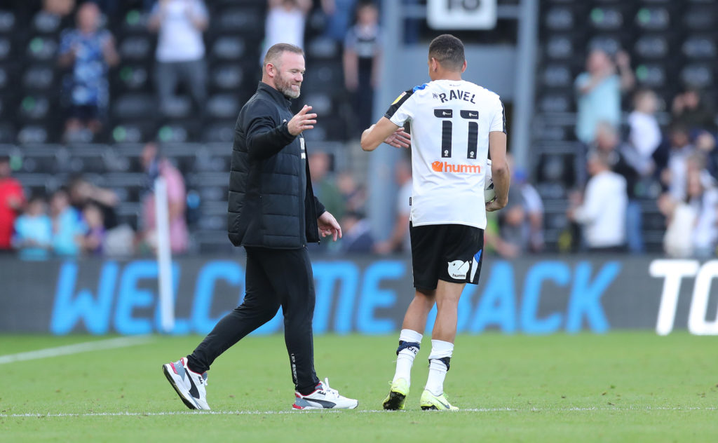 Wayne Rooney, manager of Derby with Ravel Morrison after the final whistle during the Sky Bet Championship match between Derby County and Stoke City