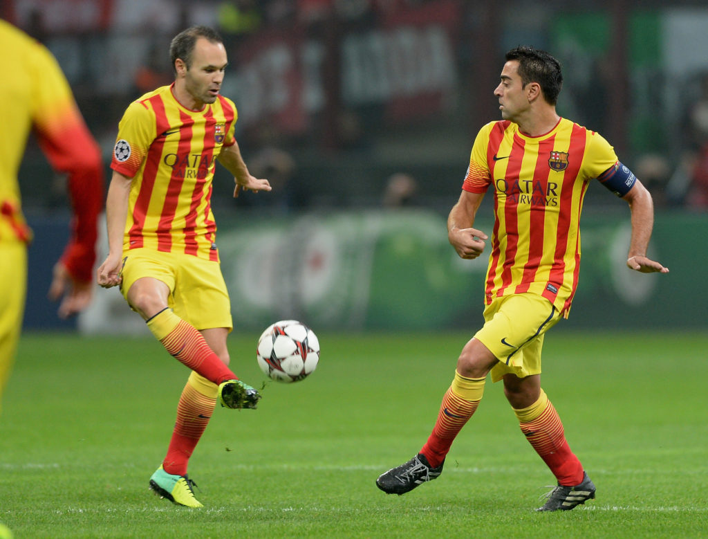 Xavi and Andres Iniesta for Barcelona