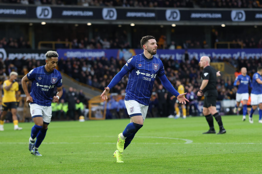 Conor Chaplin of Ipswich Town celebrates after an own goal by Matt Doherty of Wolverhampton Wanderers (not pictured), Ipswich Town's first goal during the Premier League match between Wolverhampton Wanderers FC and Ipswich Town FC
