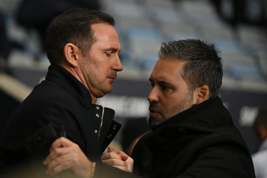 Marti Cifuentes and Frank Lampard embrace each other before Coventry City vs QPR