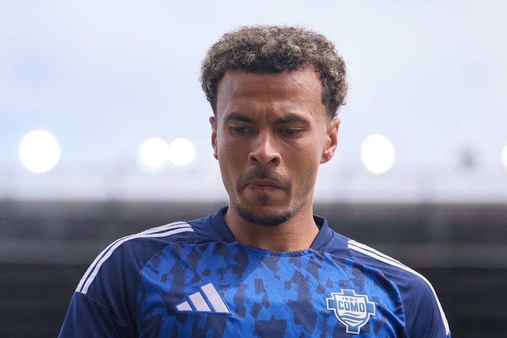 Dele Alli warms up before Como's game against Parma