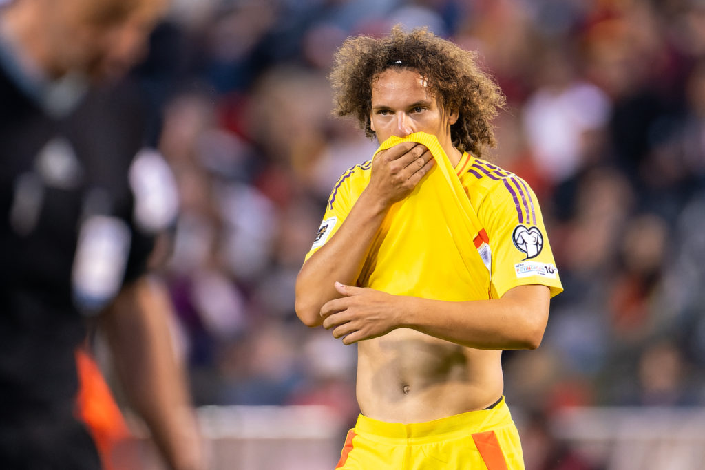 Wout Faes reacts to Belgium conceding a goal against Wales