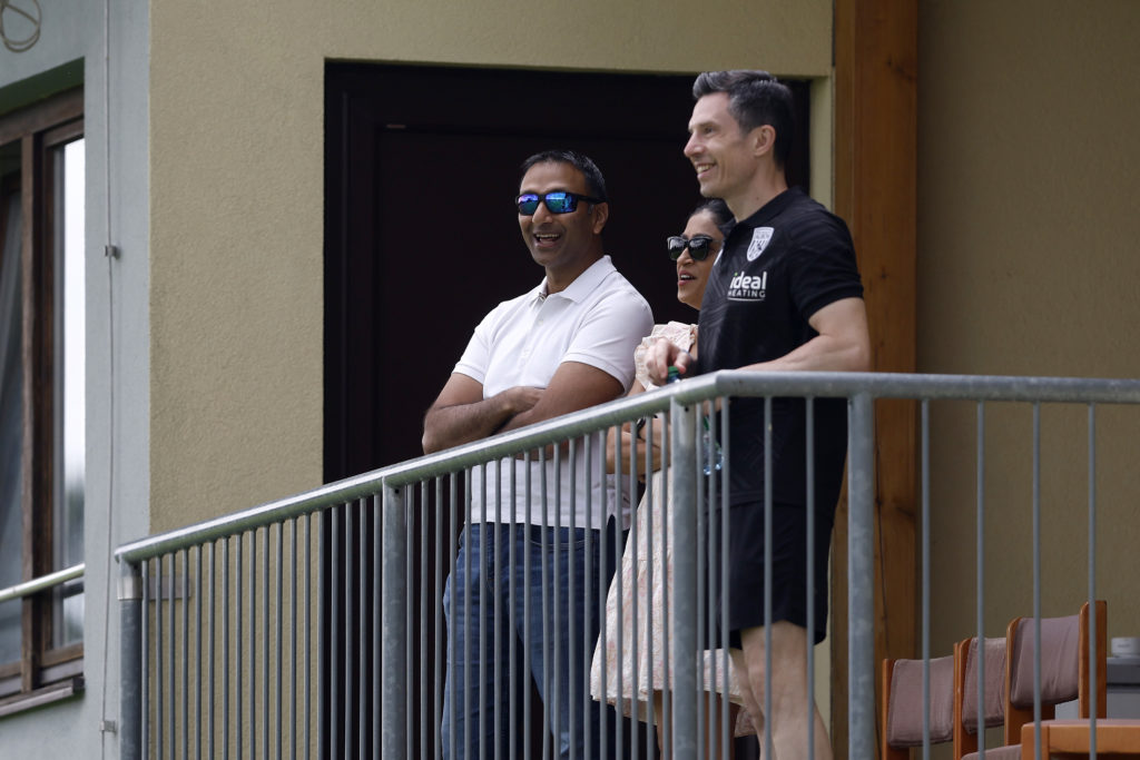 West Brom owner Shilen Patel and sporting director Andrew Nestor watch the club's pre-season friendly