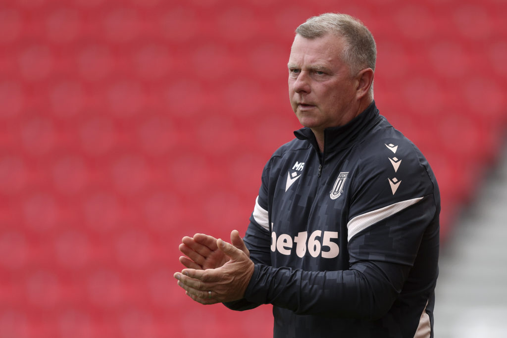 Mark Robins applauds his side during Stoke City vs Wolverhampton Wanderers