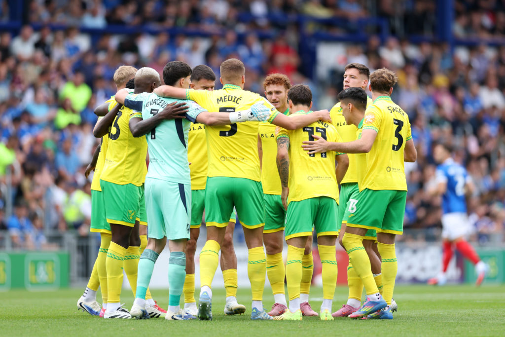 Norwich City's players huddle together before they face Portsmouth