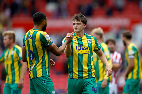 George Campbell of West Bromwich Albion congratulates Alex Williams of West Bromwich Albion