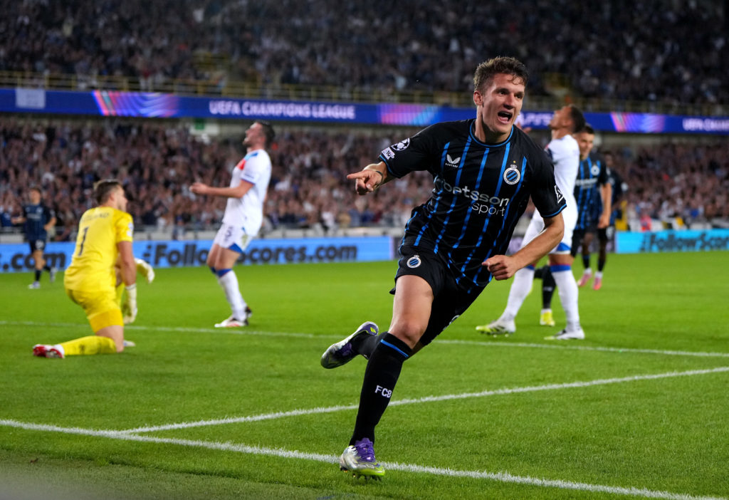 Christos Tzolis of Club Brugge celebrates scoring his team's sixth goal against Rangers