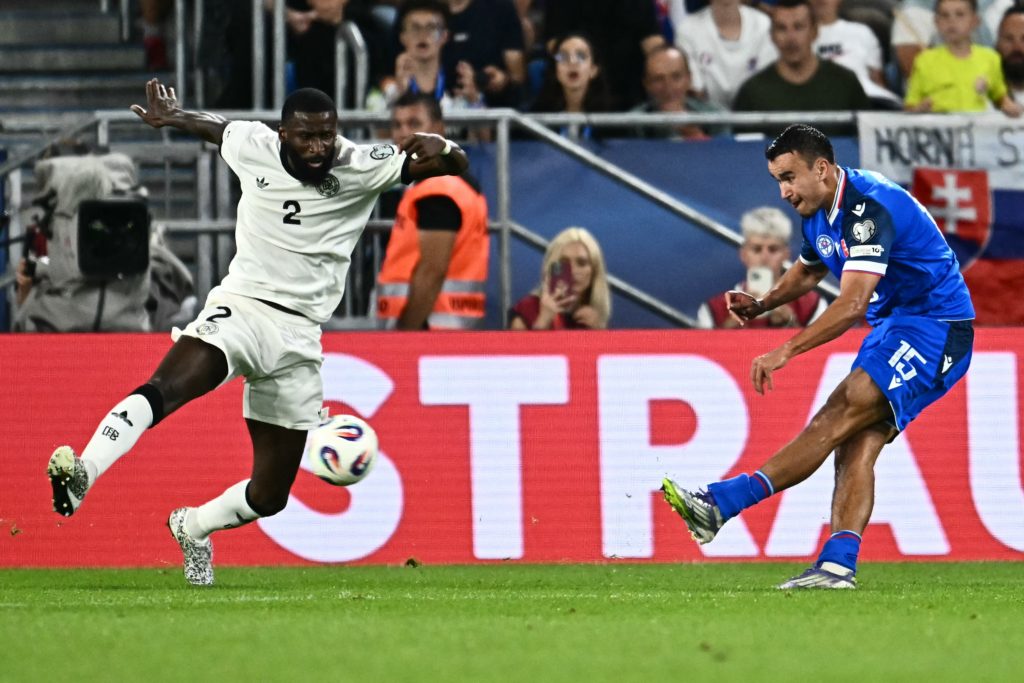 David Strelec scores past Antonio Rudiger's Germany for Slovakia in a World Cup qualifier