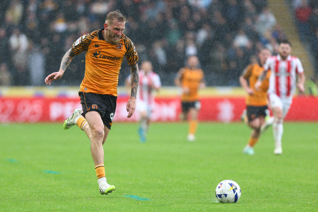 Oli McBurnie of Hull City is in action