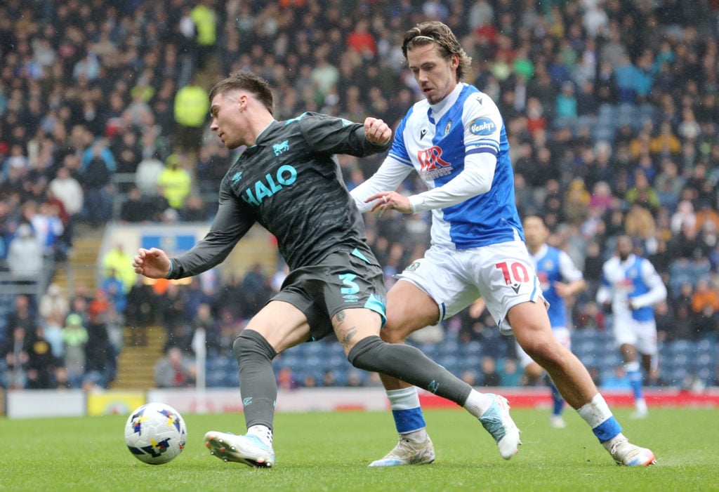 Ipswich Town's Leif Davis under pressure from Blackburn Rovers' Todd Cantwell during Blackburn Rovers v Ipswich Town - Sky Bet Championship