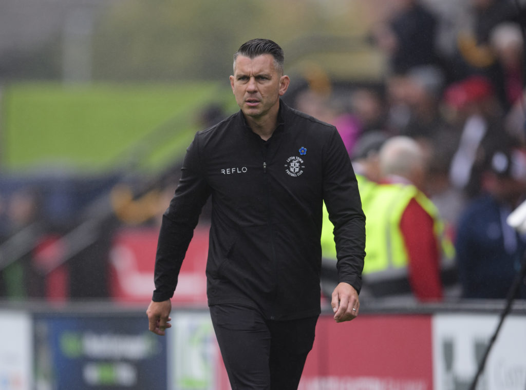 Matt Bloomfield, Luton Town manager, looks frustrated after the game against Lincoln City