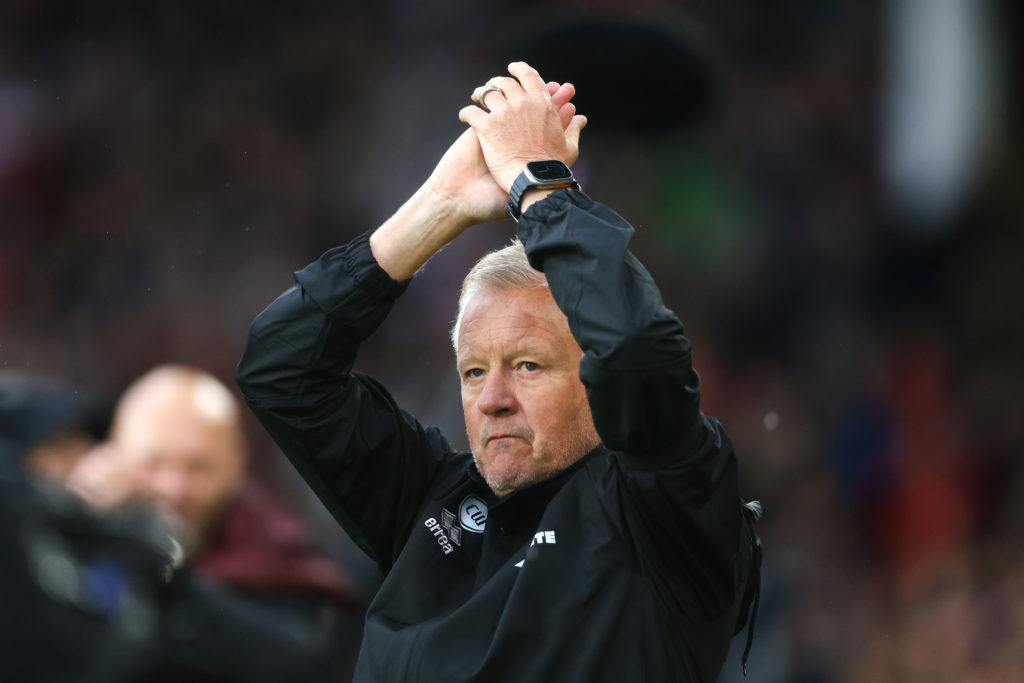 Chris Wilder, Manager of Sheffield United, applauds the fans