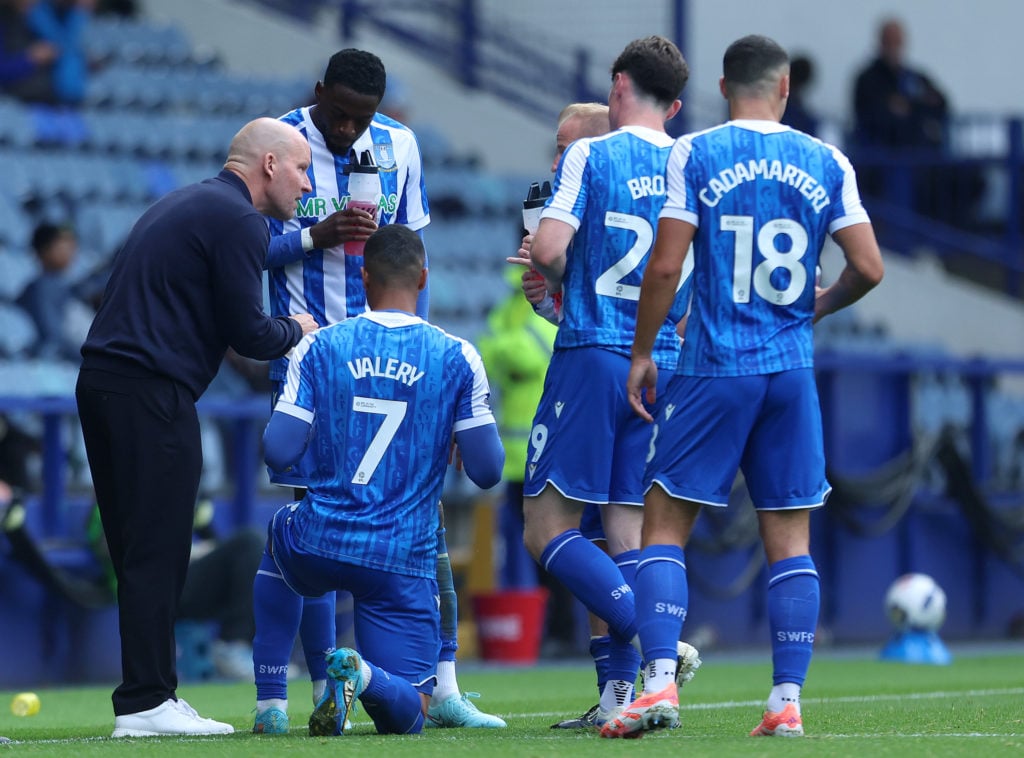 Henrik Pedersen provides instructions to the Sheffield Wednesday players