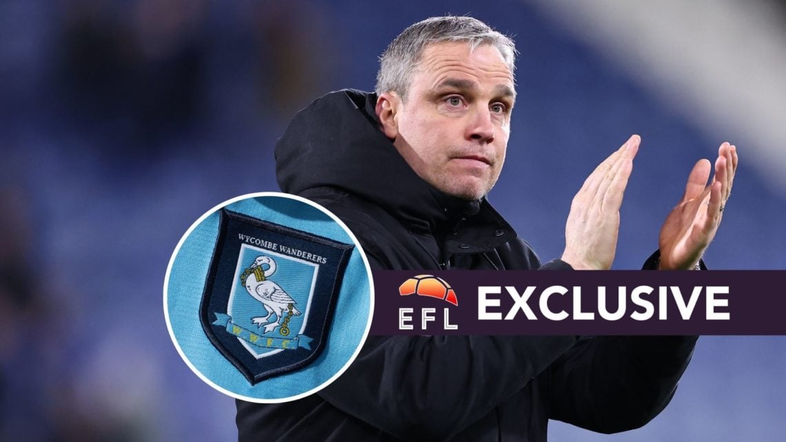 Michael Duff applauds Huddersfield Town fans after the defeat against Wrexham, the inset of the Wycombe Wanderers badge