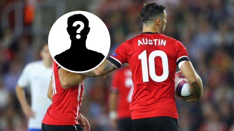 Charlie Austin and Dusan Tadic argue over taking a Southampton penalty, an inset of a mystery figure