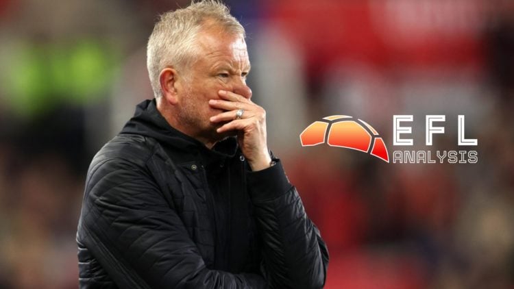 Sheffield United manager Chris Wilder looks on.