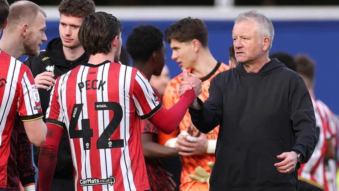 Sheffield United FC manager Chris Wilder shakes hands with Sydie Peck after a Championship game.