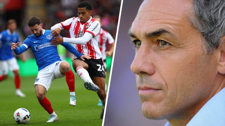 Conor Chaplin of Portsmouth battles for possession with Shea Charles of Southampton (left), Portsmouth manager Guy Whittingham looks on (right)
