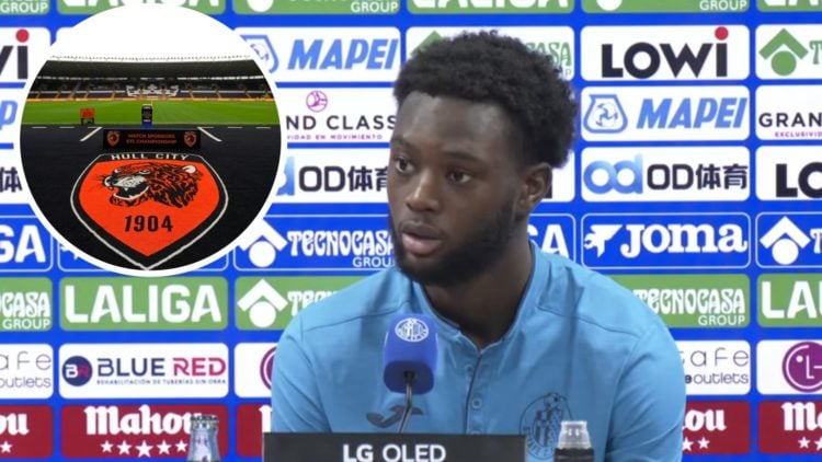Abu Kamara is unveiled as a new Getafe player during a press conference, an inset of the Hull City badge
